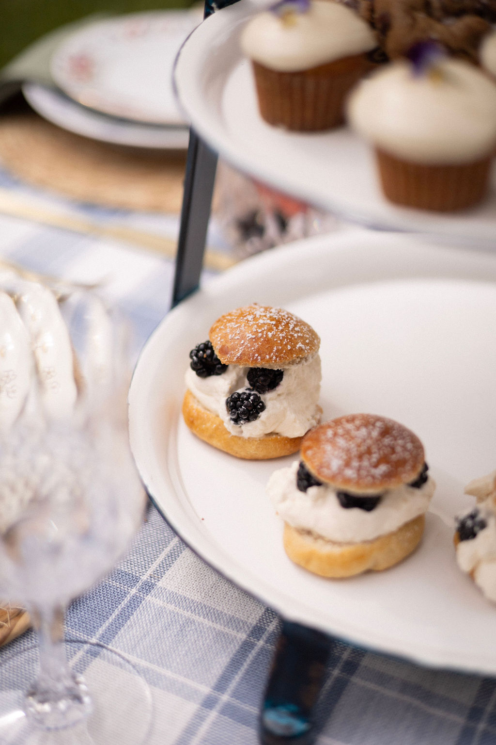 Blackberry and cream puffs from Flower and Flour on a vintage enamel stand